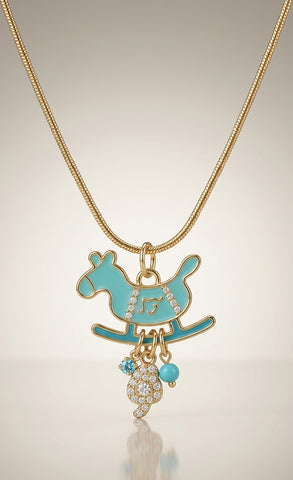 Necklace with a turquoise rocking horse pendant on a beige background